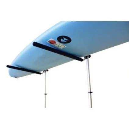 Blue surfboard resting flat on two poles